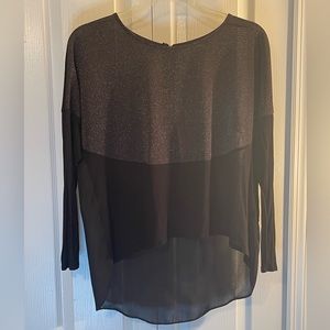 Jennifer Lopez hi-low metallic top